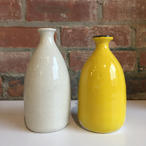 Yellow bottle/ vase with blue rim