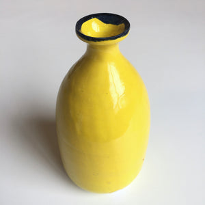 Yellow bottle/ vase with blue rim
